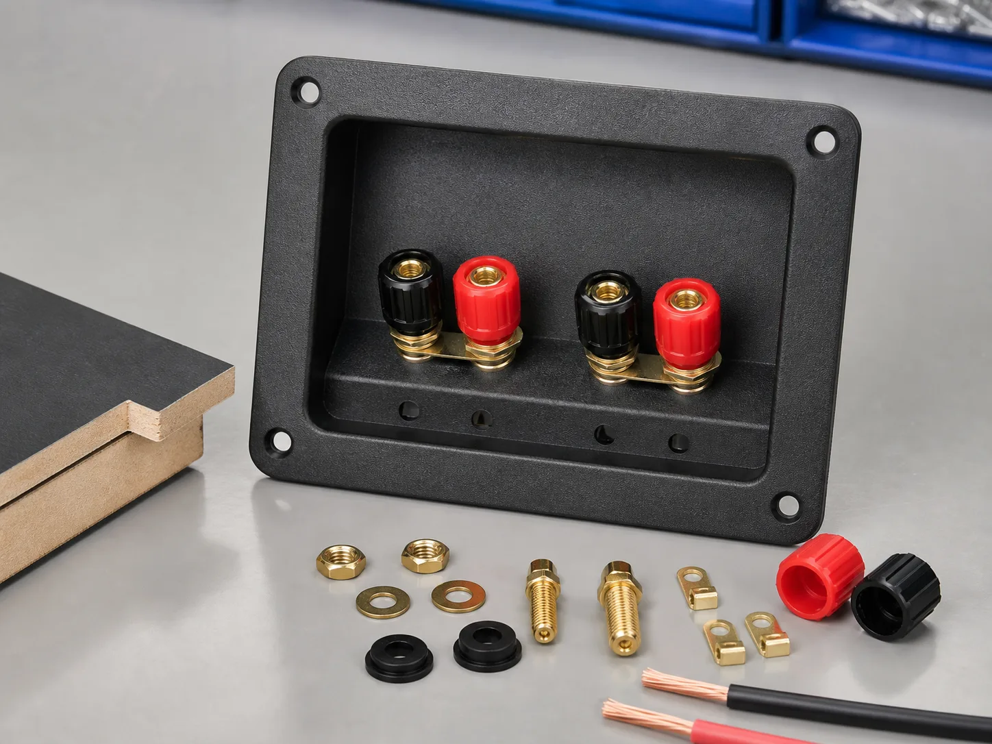 Speaker cabinet terminal cup with red and black binding posts and mounting hardware